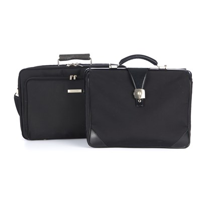 Lot 414 - Two men's designer bags, to include a black...