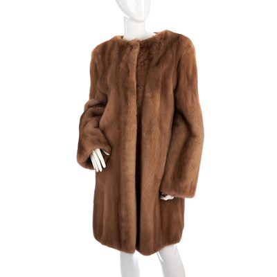Lot 431 - Saga, a knee-length collarless pastel mink...