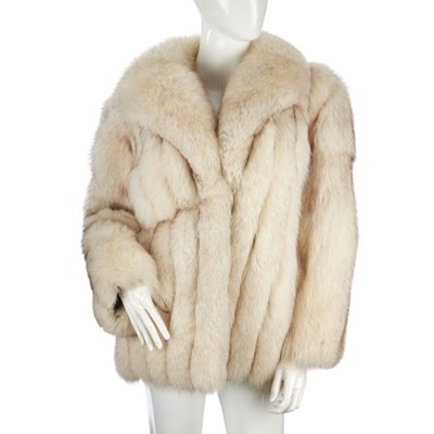 Lot 433 - A blue fox fur jacket, featuring a lapel...