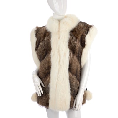 Lot 434 - A raccoon and fox fur gilet, crafted from...