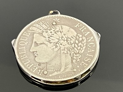 Lot 11 - A novelty French silver coin companion tool...