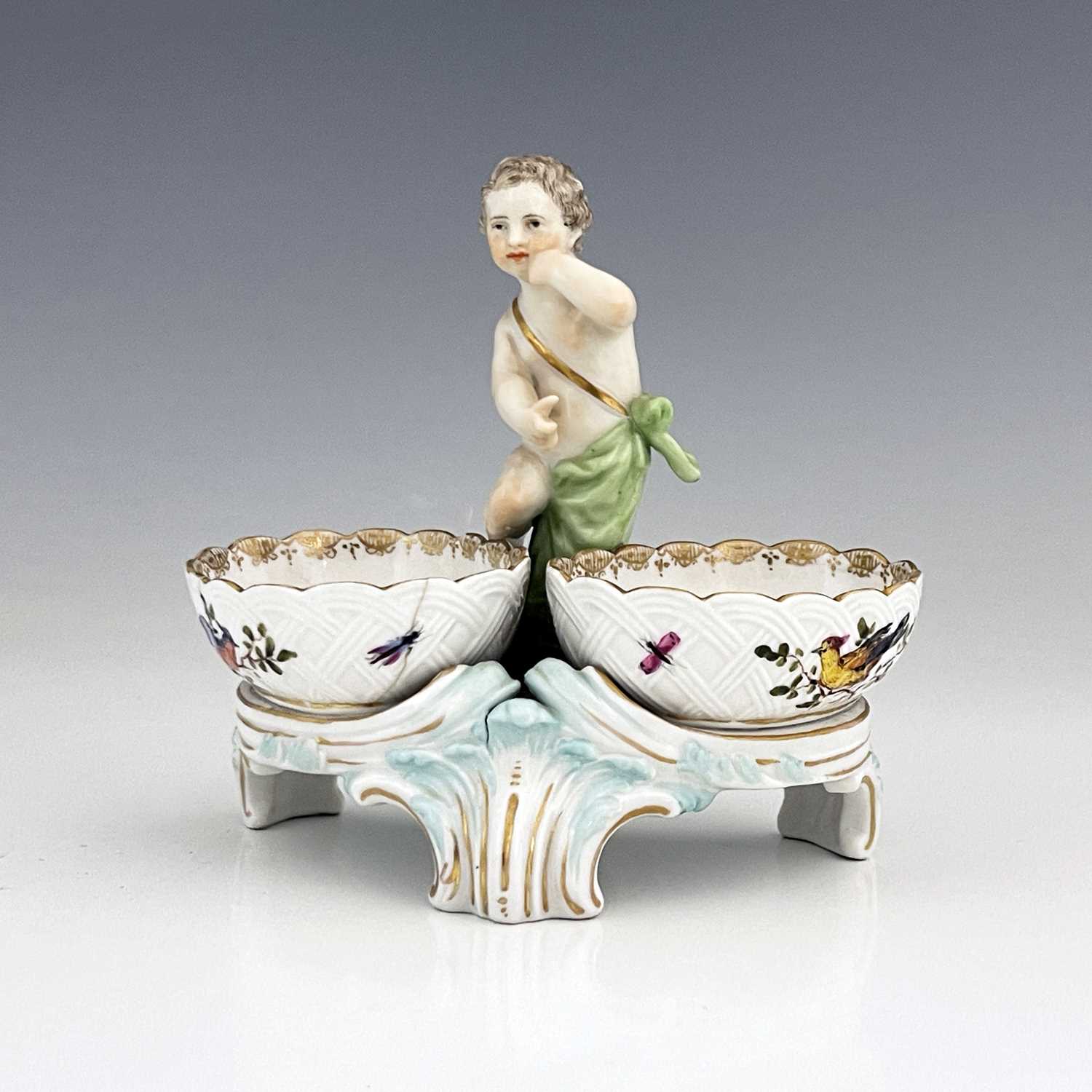 Lot 794 - A Berlin porcelain figural double salt cellar,...