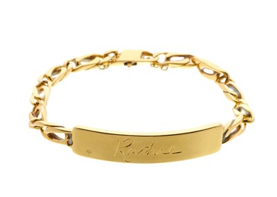 Lot 25 - An 18ct gold flat curb-link identity bracelet,...