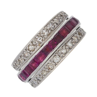 Lot 34 - An Art Deco platinum, calibre-cut ruby and...