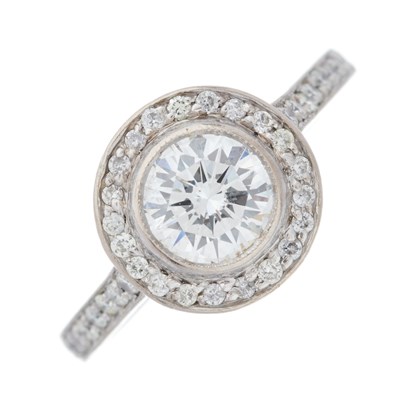 Lot 60 - An 18ct gold brilliant-cut diamond...