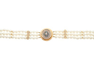 Lot 88 - A cultured pearl three-row bracelet, with gold...