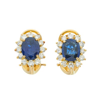 Lot 101 - A pair of 18ct gold oval-shape sapphire and...