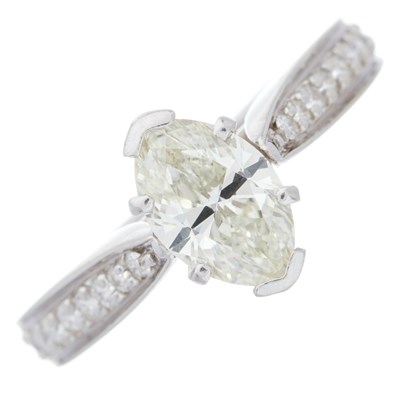 Lot 117 - An 18ct gold marquise-shape diamond...