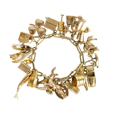 Lot 128 - A 14ct gold charm bracelet, suspending...
