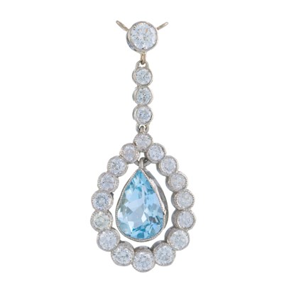 Lot 130 - A platinum pear-shape aquamarine and brilliant-...