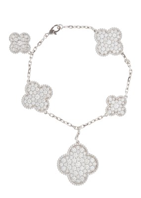 Lot 165 - Van Cleef & Arpels, an 18ct gold diamond Magic...
