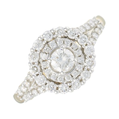 Lot 207 - An 18ct gold brilliant-cut diamond cluster...