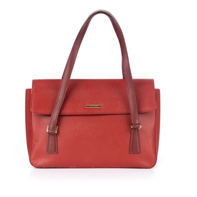Lot 283 - Burberry, a red medium flap handbag, designed...