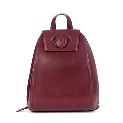 Lot 300 - Cartier, a Bordeaux leather backpack, crafted...
