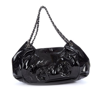 Lot 324 - Chanel, a patent leather Tweed Petal Camellia...
