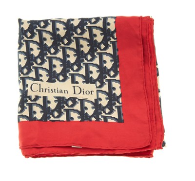 Lot 343 - Christian Dior, a silk scarf, featuring the...