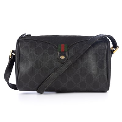 Lot 368 - Gucci, a small black Supreme handbag, crafted...