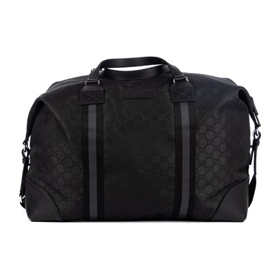 Lot 369 - Gucci, a large black nylon Web holdall,...