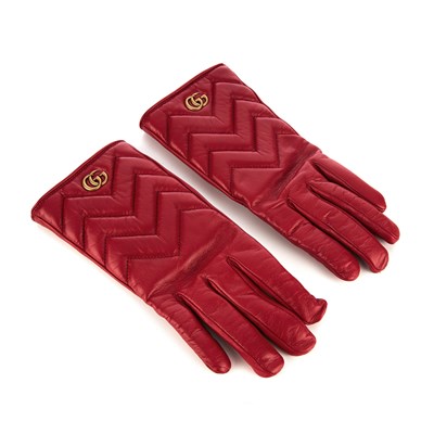 Lot 378 - Gucci, a pair of red leather gloves, featuring...