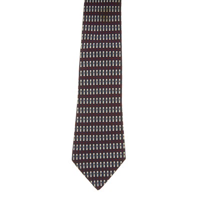 Lot 396 - Hermes, a silk tie, featuring a navy blue, red...