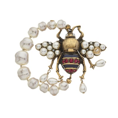 Lot 359 - Gucci, a Bee bracelet, featuring a large...