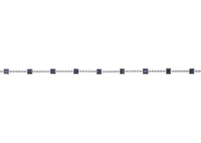 Lot 129 - An 18ct gold sapphire and diamond line bracelet