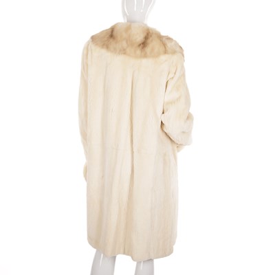 Lot 490 - A sheared mink and golden sable trimmed coat,...