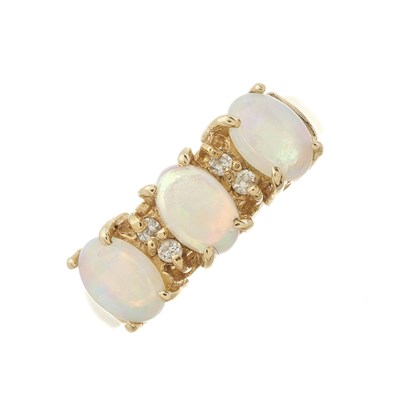 Lot 142 - A 14ct gold opal and diamond dress ring