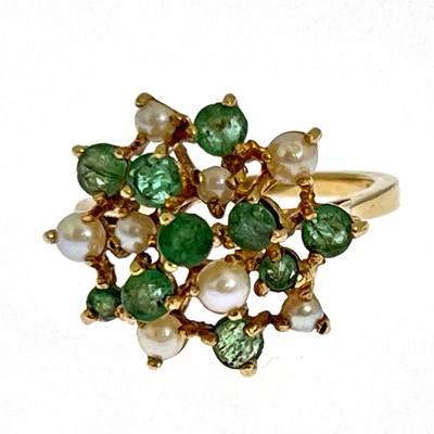 Lot 3 - A 9ct gold emerald and split pearl cluster ring