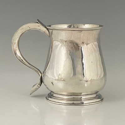 Lot 39 - A George II silver mug, of squat baluster form,...
