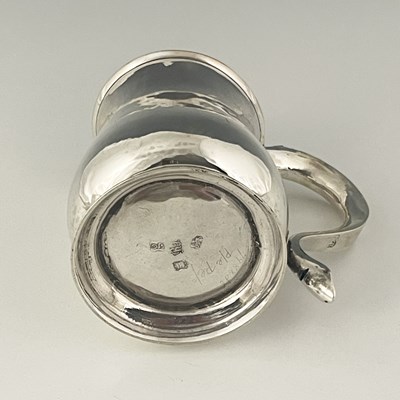 Lot 39 - A George II silver mug, of squat baluster form,...