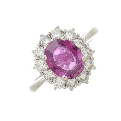 Lot 48 - An 18ct gold pink sapphire and diamond cluster ring