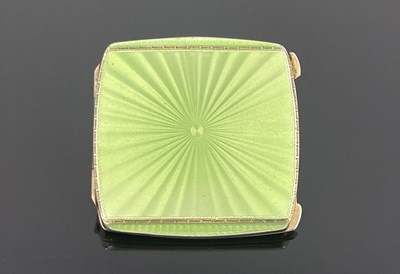 Lot 137 - An Art Deco silver gilt and enamelled compact, Albert Carter, Birmingham 1936