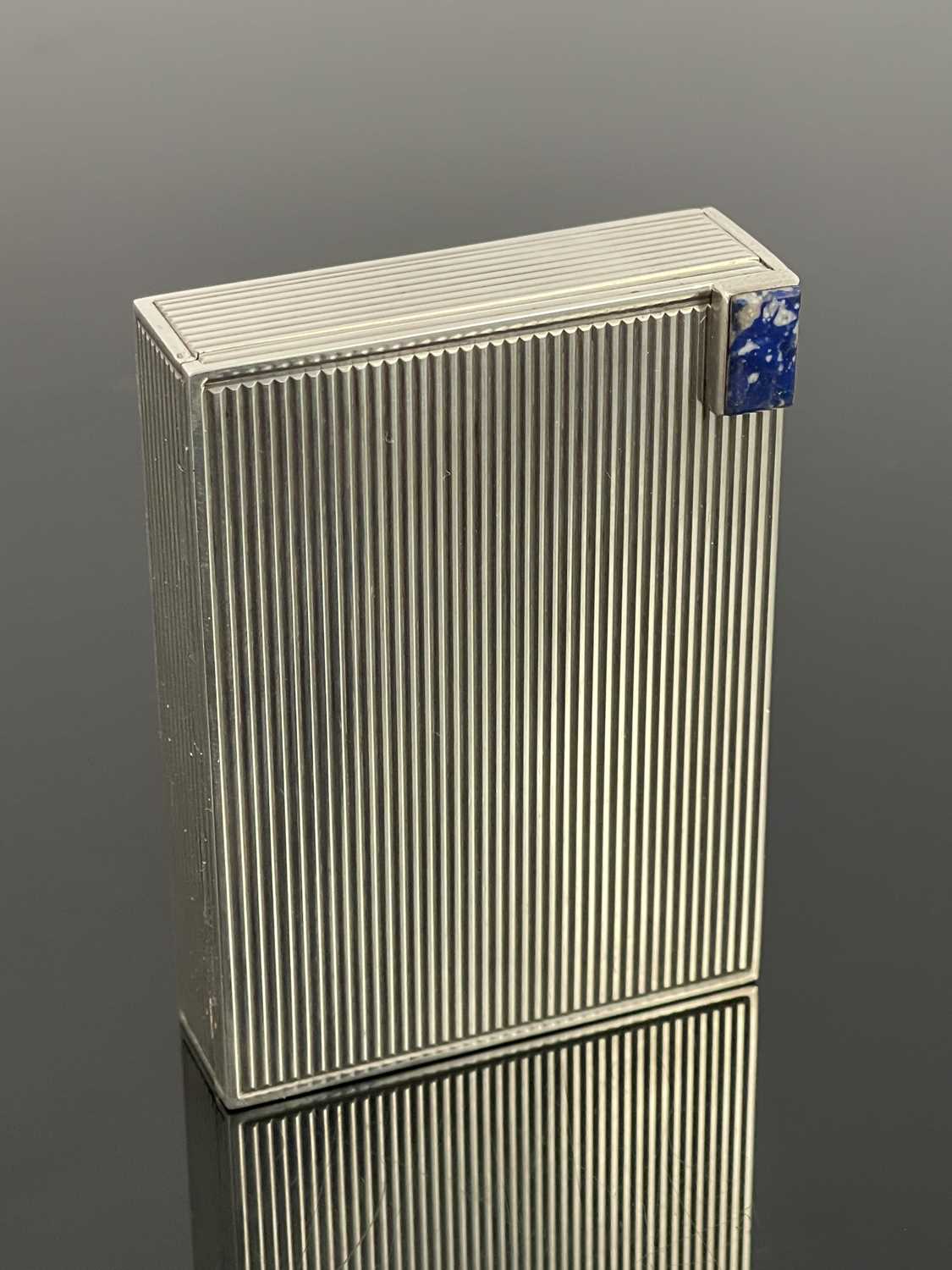 Lot 146 - An Italian Modernist silver and lapis compact, G Ciardetti, Florence
