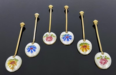 Lot 29 - A set of six Elizabeth II silver gilt and enamelled coffee spoons, Adie Brothers, Birmingham 1960