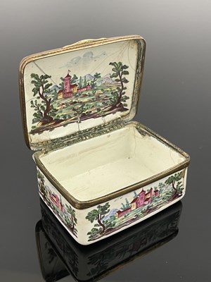 Lot 673 - A Bilston type enamelled snuff box