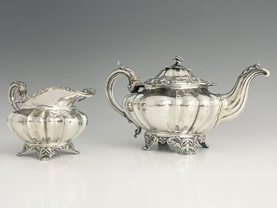 Lot 42 - A William IV silver teapot and milk jug, each...
