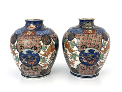 Lot 474 - A pair of Japanese Imari vases, Meiji period,...