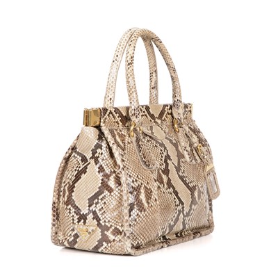 Lot 444 - Prada, a python skin handbag, featuring rolled...
