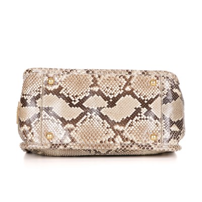 Lot 444 - Prada, a python skin handbag, featuring rolled...