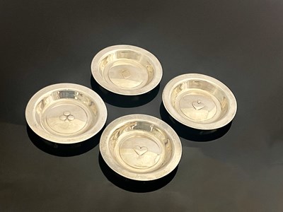 Lot 382 - A set of four George VI silver counter dishes,...