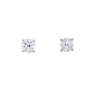 Lot 52 - A pair of 18ct gold brilliant-cut diamond single-stone stud earrings