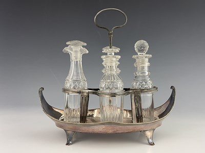 Lot 20 - A George III Old Sheffield Plate and cut glass four bottle cruet stand