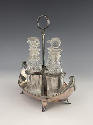 Lot 20 - A George III Old Sheffield Plate and cut glass four bottle cruet stand