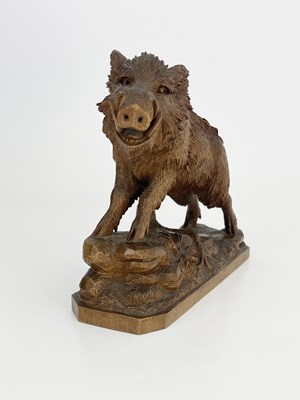 Lot 298 - A Black Forest carved wood figure of a boar,...