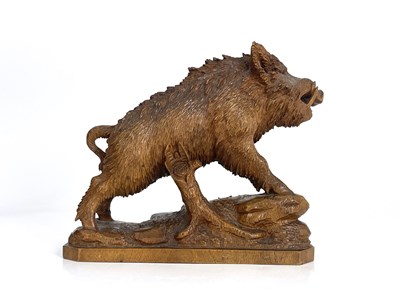 Lot 298 - A Black Forest carved wood figure of a boar,...