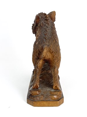 Lot 298 - A Black Forest carved wood figure of a boar,...