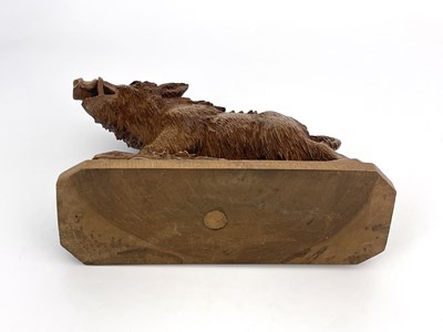 Lot 298 - A Black Forest carved wood figure of a boar,...