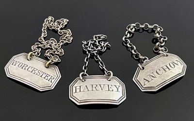 Lot 76 - Three Victorian and earlier silver condiment labels for Harvey, Anchovy and Worcester