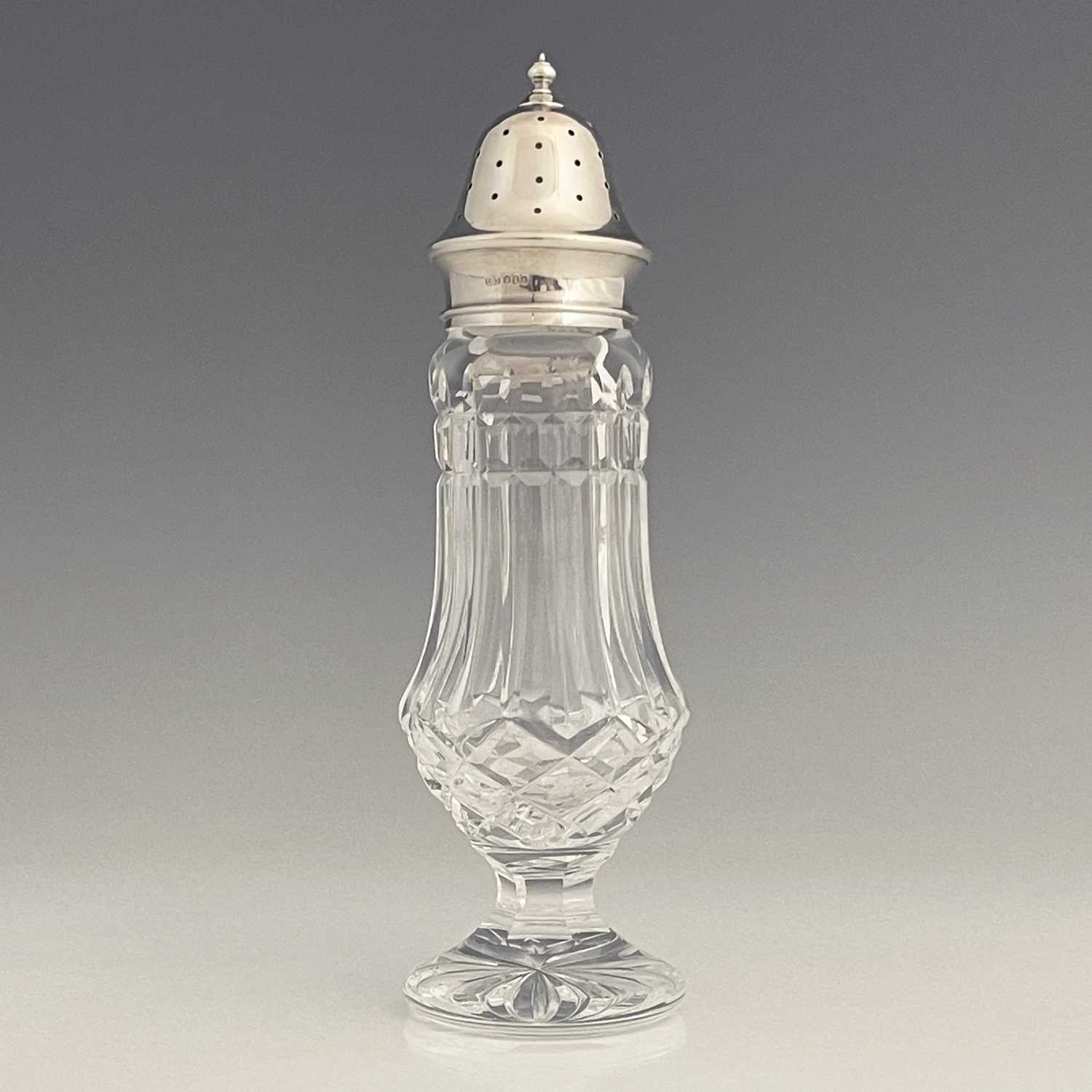 Lot 106 - A twentieth-century glass and silver topped...